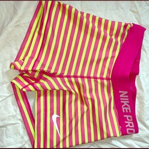 Pink and Yellow Nike Pros